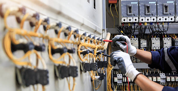 Professional Electrician technician working in Oakwood, GA